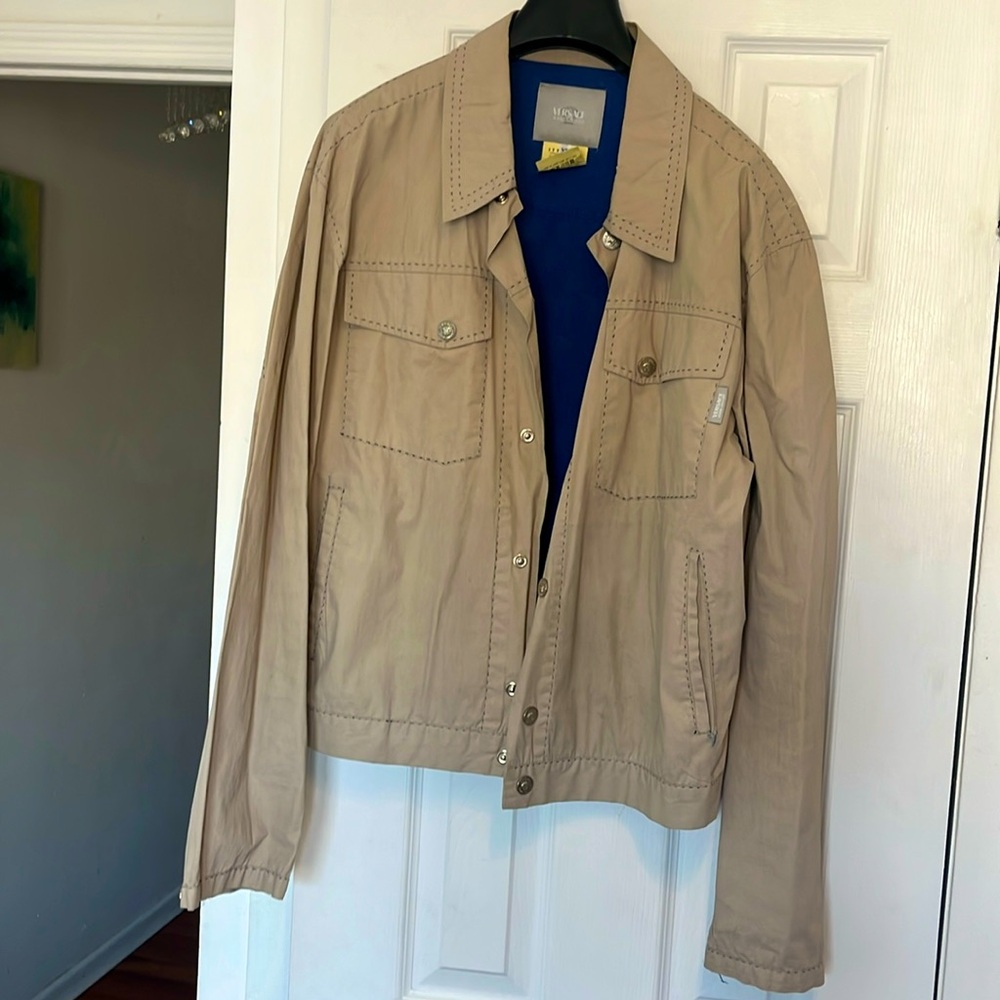 Dapper Versace wind breaker jacket, stunning with minor rips that can be sown.